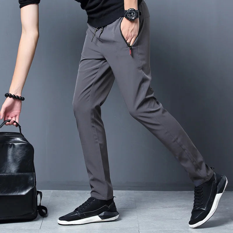 Summer men's casual pants slim fit thin Korean version ice silk pants Jinlun sports pants straight tube quick drying pants